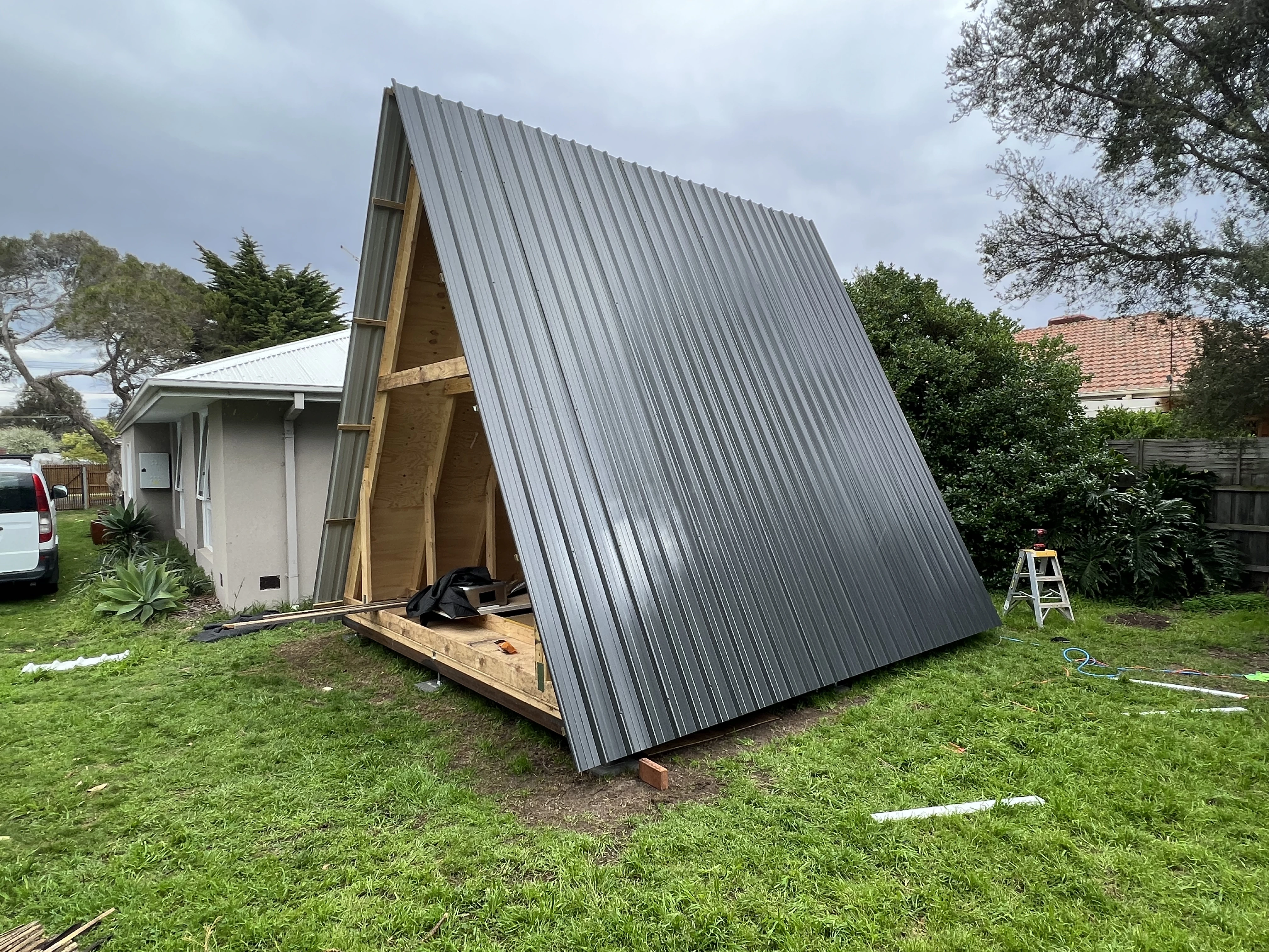 Front view of the exterior of an A-frame house
